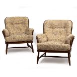 A PAIR OF ERCOL STAINED WOOD UPHOLSTERED SPINDLE BACK ARMCHAIRS each 81cm wide x 84cm deep x 83cm