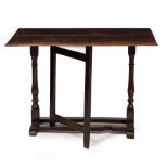 A 17TH CENTURY AND LATER OAK GATELEG TABLE with single folding leaf, 91cm x 31cm x 70cm (58cm when