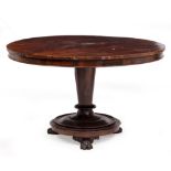 A 19TH CENTURY AND LATER ROSEWOOD CIRCULAR CENTRE TABLE with turned support and cast iron paw