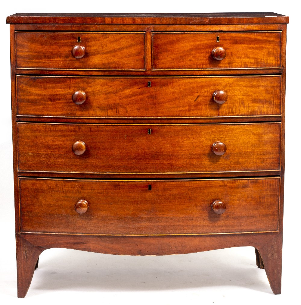 A 19TH CENTURY MAHOGANY BOW FRONTED CHEST OF TWO SHORT AND THREE LONG DRAWERS with turned knob