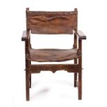 A CONTINENTAL POSSIBLY SPANISH CHESTNUT OPEN ARMCHAIR with leather upholstered back and seat, with