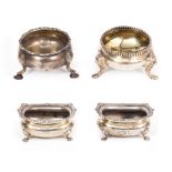 A PAIR OF SILVER SALTS by Reid & Sons, an early 19th century silver salt with hoof feet and