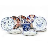A PAIR OF 18TH CENTURY CHINESE PORCELAIN PLATES with floral swag decoration together with three