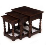 A NEST OF THREE MODERN OAK RECTANGULAR OCCASIONAL TABLES with bobbin and reel turned legs and of