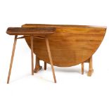 A LIGHT ELM DROP LEAF DINING TABLE 128cm wide x 72cm high together with a light elm Ercol style