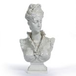 AN ITALIAN TIN GLAZED POTTERY BUST of a lady with her hair tied up and wearing a pearl necklace,