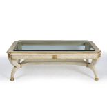 A CREAM PAINTED PARCEL GILT RECTANGULAR LOW OCCASIONAL OR COFFEE TABLE with glass inset top and