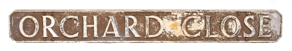 A BULLINGDON STREET SIGN 'Orchard Close', 132cm x 15cm Condition: paint losses, scratches, marks and