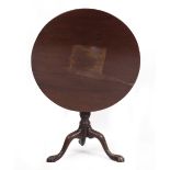 AN EARLY 20TH CENTURY MAHOGANY NEST OF THREE OCCASIONAL TABLES with Maple & Co label and caved