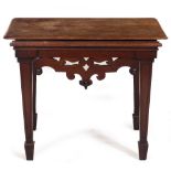 A VICTORIAN MAHOGANY STAND with rectangular tapering legs and later top, 81cm wide x 51cm deep x