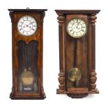 A WALNUT CASED VIENNA REGULATOR TYPE WALL CLOCK with two pair enamel dial, 34cm wide x 80cm high