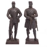 A PAIR OF 19TH CENTURY CAST IRON MODELS OF INFANTRY SOLDIERS one of a Highland Regiment, the other