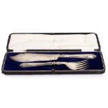 A CASED SET OF SOLID SILVER FISH SERVERS with marks for Sheffield 1951, the knife 31cm in length,