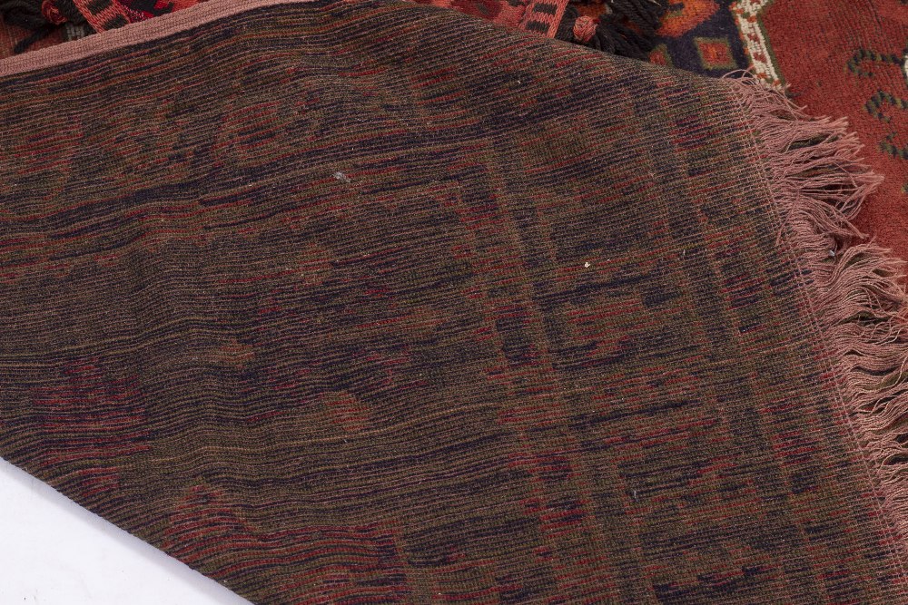 A DECORATIVE RED GROUND RUG 160cm x 132cm together with an old cushion constructed from an - Image 2 of 7