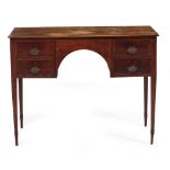 A 19TH CENTURY MAHOGANY KNEEHOLE DRESSING TABLE with four drawers and standing on square tapering