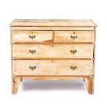 AN OLD PINE POSSIBLY SWEDISH CHEST OF TWO SHORT AND TWO LONG DRAWERS with high bracket feet, 101cm