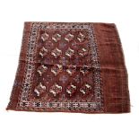 AN AFGHAN BROWN AND ORANGE GROUND RUG 147cm x 90cm together with a Tekke Turkoman small rug or
