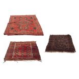 AN EARLY 20TH CENTURY TURKISH RED GROUND RUG with geometric decoration, 124cm x 208cm together