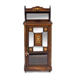 AN EDWARDIAN ROSEWOOD SATINWOOD AND BONE INLAID MUSIC CABINET with a raised mirrored back and