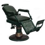 A GREEN PAINTED CAST IRON DENTISTS CHAIR 128cm wide x 58cm deep x 106cm high At present, there is no