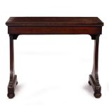 A 19TH CENTURY MAHOGANY RECTANGULAR TOPPED LIBRARY TABLE with shaped end supports and turned bun