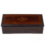 A 19TH CENTURY SWISS MUSICAL BOX the box 50.5cm wide x 13cm high Condition: the movement with