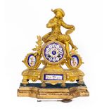 A 19TH CENTURY FRENCH GILT METAL MANTLE CLOCK with hand painted porcelain plaques, porcelain dial