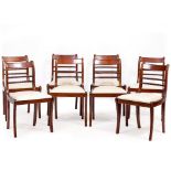 A SET OF EIGHT BRIGHTS OF NETTLEBED REGENCY STYLE MAHOGANY BAR BACKED DINING CHAIRS with upholstered