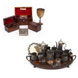 A 19TH CENTURY MAHOGANY TEA CADDY with lidded compartments within and central glass mixing bowl,