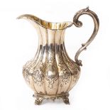 A VICTORIAN SILVER MILK JUG London 1858, bearing marks for S.M., 17cm high, 256.5 grams in weight