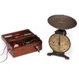 A VICTORIAN A.E. DEAN SHOCK THERAPY BOX with a further cast iron Salter Household scale, no.46 At