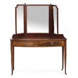 AN EDWARDIAN MAHOGANY BOW FRONTED DRESSING TABLE with a three sectional mirror above two short