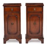 A PAIR OF MODERN MAHOGANY BEDSIDE CABINETS with single drawers over cupboard doors, standing on