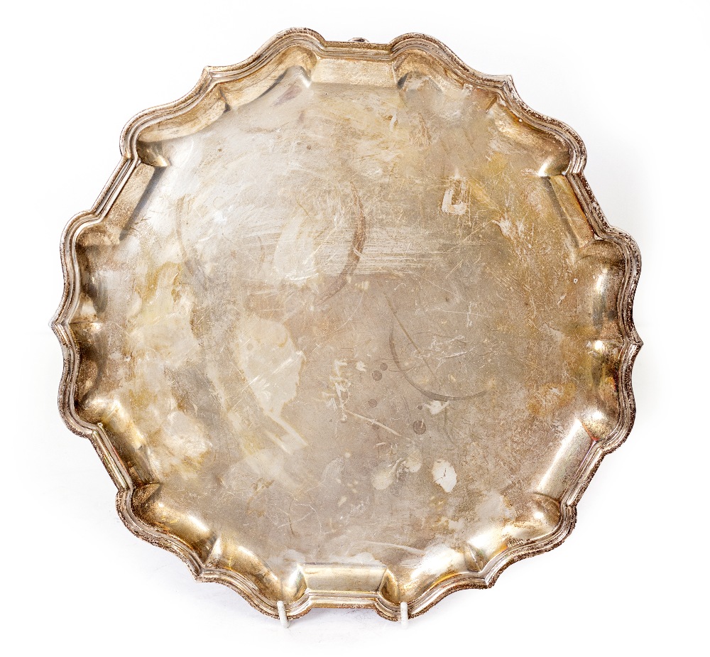 A LARGE SILVER TRAY with a piecrust edge by Mappin and Webb, bearing marks for London 1911, 31.5cm x