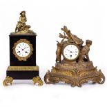 A CONTINENTAL BLACK SLATE AND CAST BRASS MOUNTED MANTLE CLOCK with enamel dial, the movement