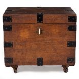 A 19TH CENTURY IRON BOUND OAK SILVER CHEST with carrying handles to the side (one later) and on