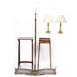 A BRASS STANDARD LAMP of column form, two brass table lamps, a single table from a nest of tables, a