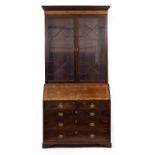 A 19TH CENTURY MAHOGANY BUREAU BOOKCASE with twin astragal glazed doors, adjustable shelves above