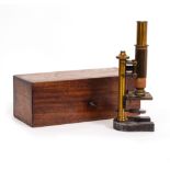 AN E.LEITZ WETZLAR NUMBER 12012 MICROSCOPE with an additional lens in a fitted mahogany box with
