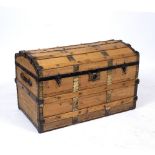 A VICTORIAN DOME TOPPED IRON BOUND TRUNK with striped paper lined interior, 91cm wide x 51cm deep