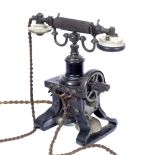 A 19TH CENTURY L M ERICSSON & SON SKELETAL TABLE TELEPHONE with black painted frame and possibly
