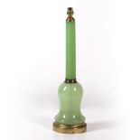 AN OLD GREEN GLASS AND BRASS MOUNTED TABLE LAMP 55.5cm high