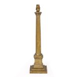 AN OLD BRASS TABLE LAMP of column form, with stepped base, 54cm high