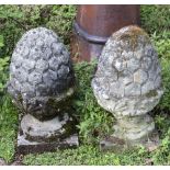 A PAIR OF CAST RECONSTITUTED STONE PINE CONE FINIALS each 27cm diameter x 50cm high