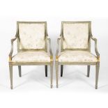 A PAIR OF 18TH CENTURY FRENCH STYLE GREY PAINTED OPEN ARMCHAIRS with floral upholstery to the