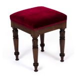 A REGENCY ROSEWOOD SQUARE STOOL with red Draylon upholstered overstuffed seat and carved turned