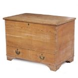 A VICTORIAN PINE MULE CHEST with lifting lid and twin drawers beneath, all standing on bracket feet,