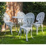 A WHITE PAINTED CAST ALUMINIUM CIRCULAR GARDEN TRIPOD TABLE with pierced top, 80cm diameter x 69cm