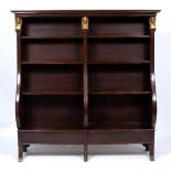 A 19TH CENTURY MAHOGANY OPEN FRONTED BOOKCASE of Bombe form with gilt Egyptian mask mounts, the twin