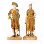 A PAIR OF VICTORIAN WORCESTER BLUSH IVORY FIGURINES depicting a Turkish gentleman and his wife, both